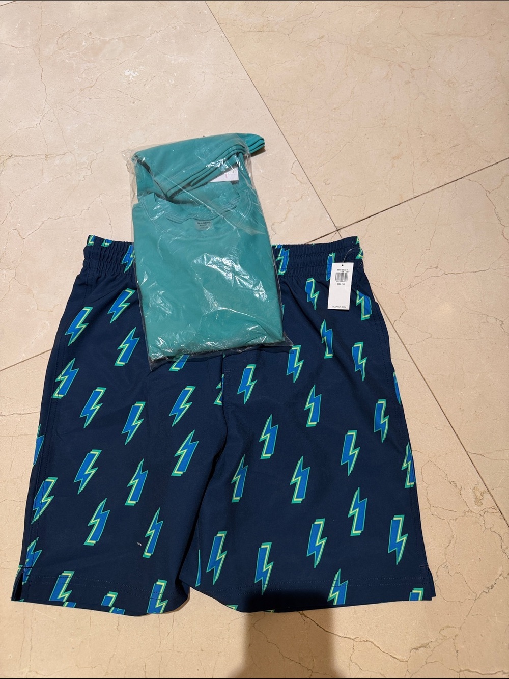 Kids Navy Lightning Bolt Swim Trunks with Teal rashguard  Tee